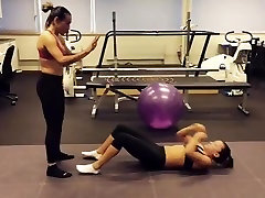 Ali Riley & Marta workout in sports bras and leggings