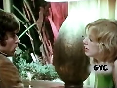 Skanky blonde teen strokes hard dick gently in a retro porn video