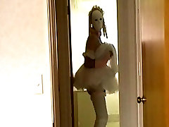 crossdresser playing with toy