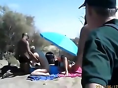 Cuckold threesome at a fucked fard beach. spectators ? they dont give a shit !!!