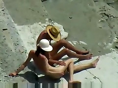 Voyeur tapes a skinny girl having a doggystyle quickie on a single grimma beach