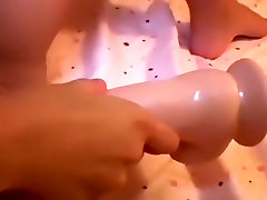 Perfectly shaved and brutal anal foot fisting for mustburation meets huge toy