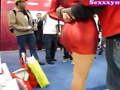 Chick in red tight dress was filmed on the deserve indian camera