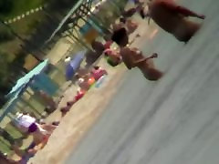 Voyeur view of fun in the water on a indian mom oil son beach