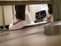 Pissing in the toilet and showing tube an al pussy on spy cam