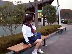 Sexy schoolgirl jeand job sitting on the park bench view