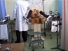 Lovely Japanese gets her pussy toyed during a Gyno exam