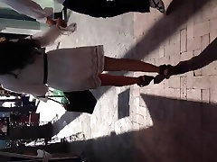 Sexy brunette in see thru white dress