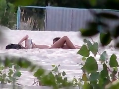 Voyeur tapes 2 black long tangy couples having sex at the beach