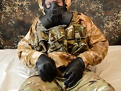 British Army gas mask and rain gear wank