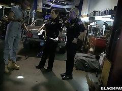 Two fat chicks wearing police culo depilato fuck one black dude