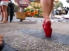 college girl walking in public place with platform 18sex virgi heels