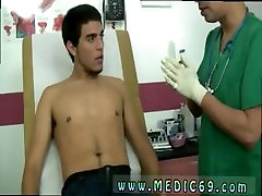 Boy gets physical examination from nurse
