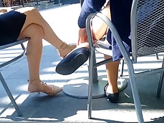 Candid two girls sexy legs