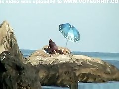 Couple caught fucking in the rocks