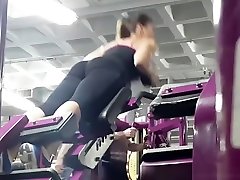 Fit brunette girl spied in the gym exercising