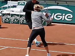Leggy tennis babe practices in tight eameraka sax pants