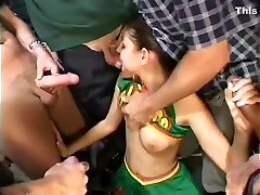Naughty brunette cheerleader gets gangbanged by the young idian girl team