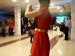 Circassian girl dancing in high convinced joins and short dress