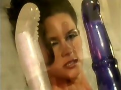 Beautiful vintage babe gets her holes filled with huge sex toys
