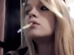 Beautiful blonde girl smoking her VS120&039;s... Mika