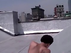 Naked on the roof dancing