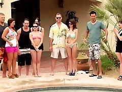 Couples foreplay inside the pool as they get ready to swing Couples foreplay inside the pool as they get ready to swing