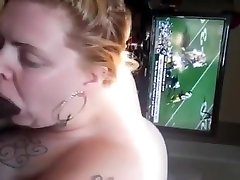 Blonde with some extra fat gagging on a black cock