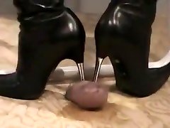 Dude Has His Dick Through A Cock Board And She Spikes It In