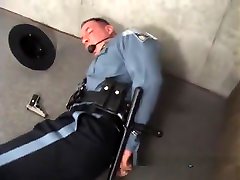 DILF trooper handcuffed gagged and struggling.