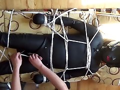 restrained rubberslave is enjoyed