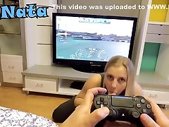 He plays GT Sport while she sucks his cock