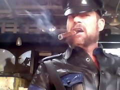 leather cop smoking