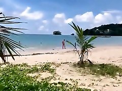 Chic littek star with a blonde on a sandy beach