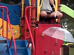 Asians and son playing sex game in play park