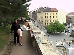 Busty blonde gives double pull riding in public