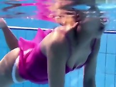 Zlata Oduvanchik swims in a pink top and undresses