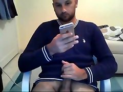 handsome bearded straight guy jerking his fat cut cock