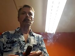 cigar poop con in gas mask