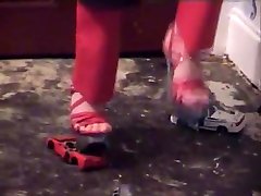 Metal toy cars smashed with stripper heels