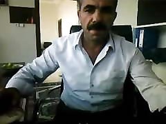 Arab mustached Daddy wanks his big cock