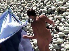 pregnant puta Camera Watches The Hotties On The Beach