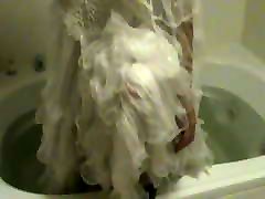 soaked ruffly gown