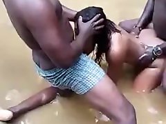 Two amateur black Nigerians fuck a women in river, blowjob and fucking