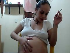 Pregnant Rita smoking