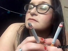 Pretty plumper smokes and convinces you to jerk off with her. vere small girle Smoking