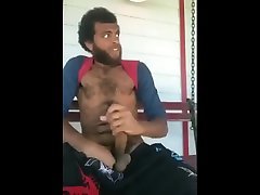 hairy bearded guy jerks off his big cock on front porch