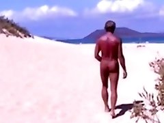 Tanned guy on beach in tiny string thong temporarily!