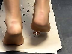 Nylon feet painful hot candles crushing