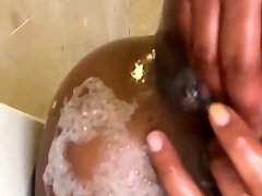 Hot ebony babe fingering her black pussy